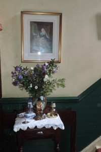 Here's the table where you can leave your calling card for Mr. Holmes. Notice there's another portrait of Queen Victoria